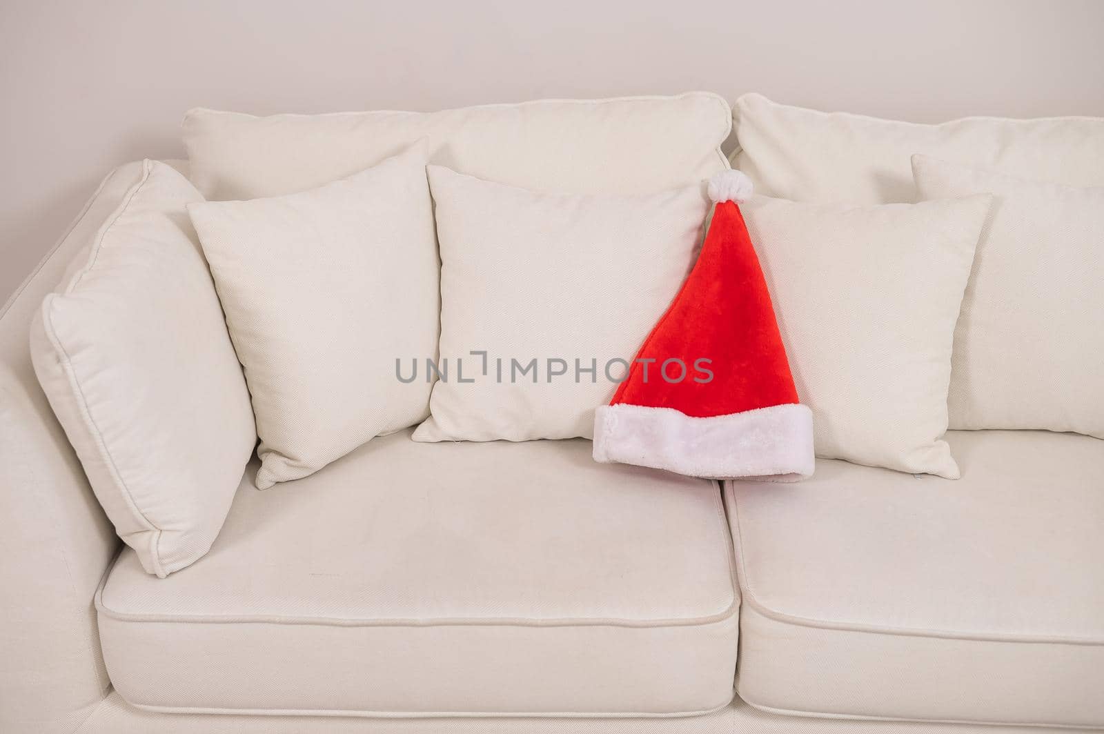 Santa claus hat on a white sofa