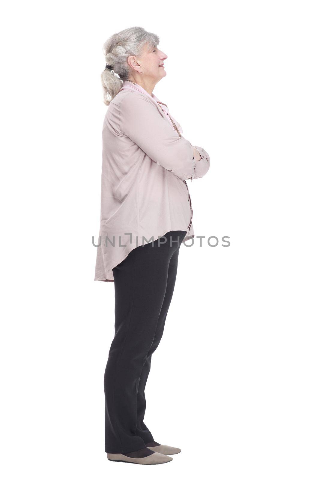 in full growth.smiling old lady pointing at you. isolated on a white background.