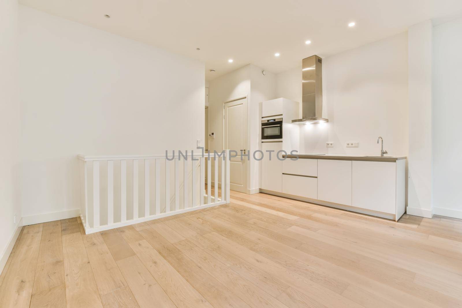 Luxurious kitchen area with wood parquet floor