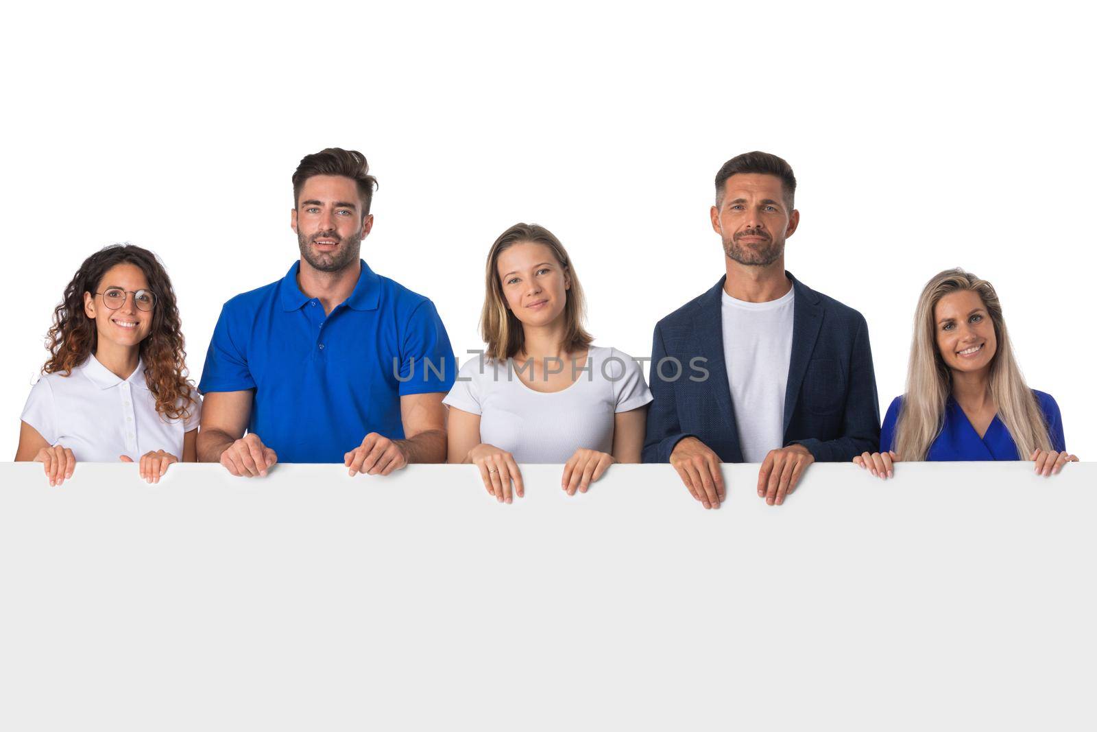 Happy young group of people standing together and holding a blank sign for your text, isolated on white background