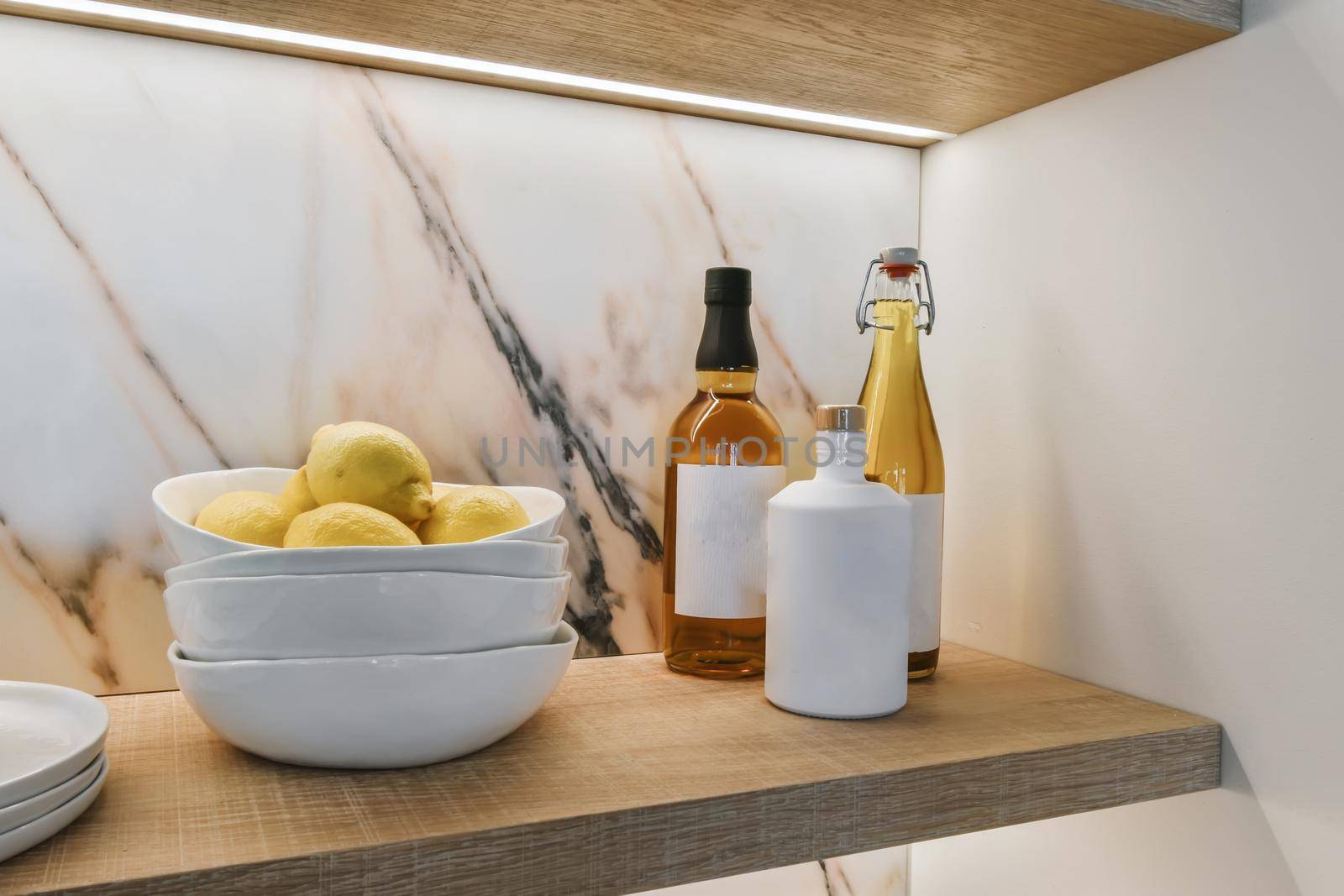 Stunning kitchen decor in the form of salad bowls with lemon inside