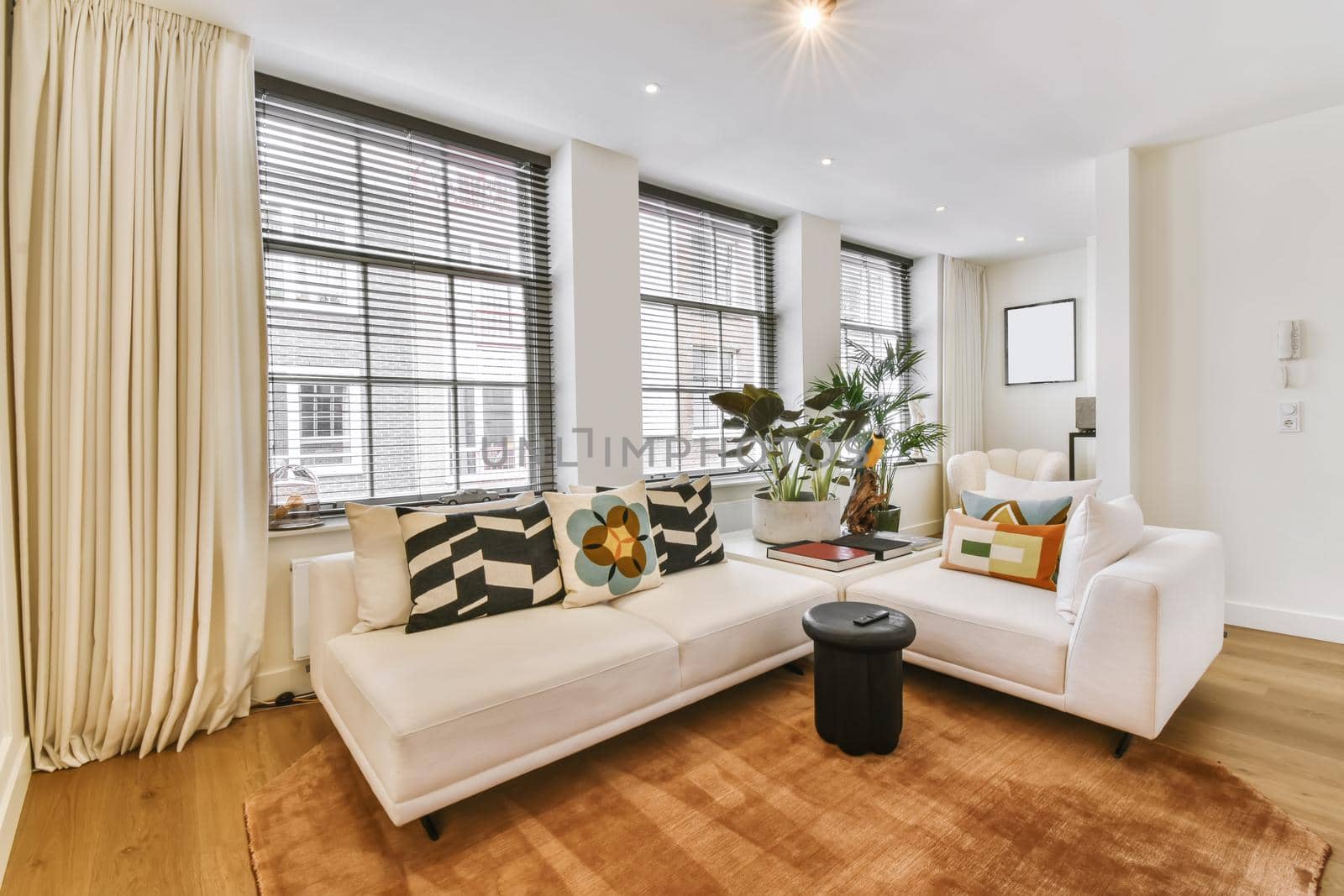 Stunning living room with white sofa and stylish throw pillows