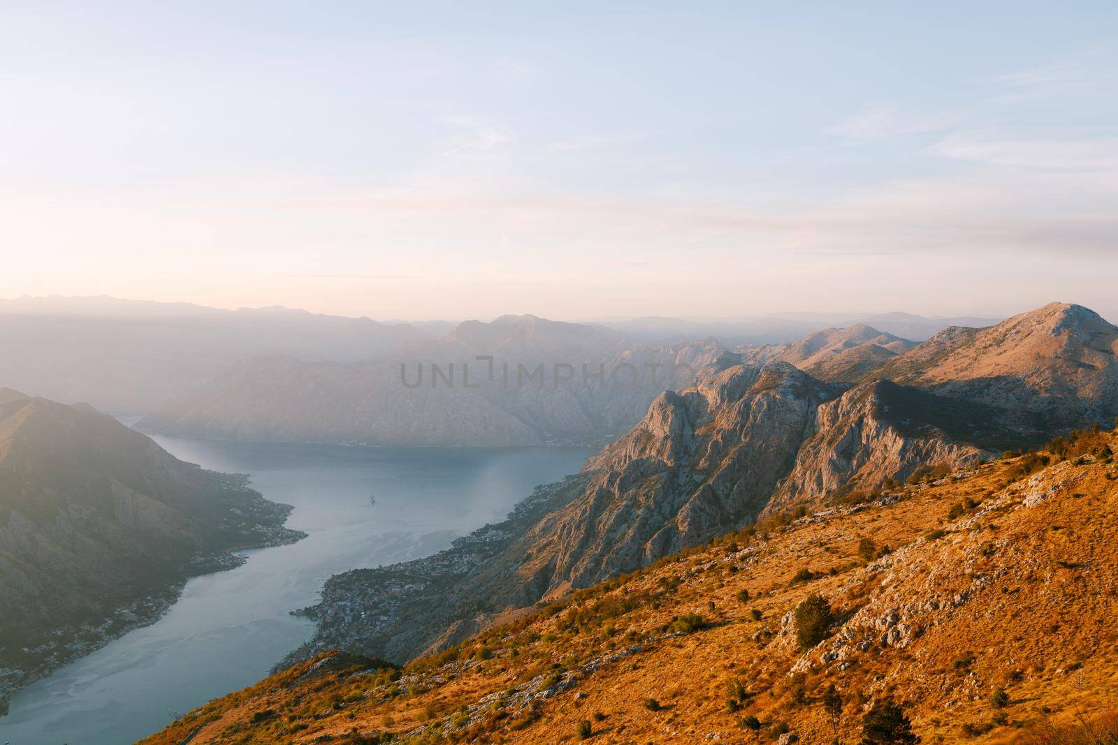 Stony mountains in the fog over the Kotor Bay. Mount Lovcen. High quality photo