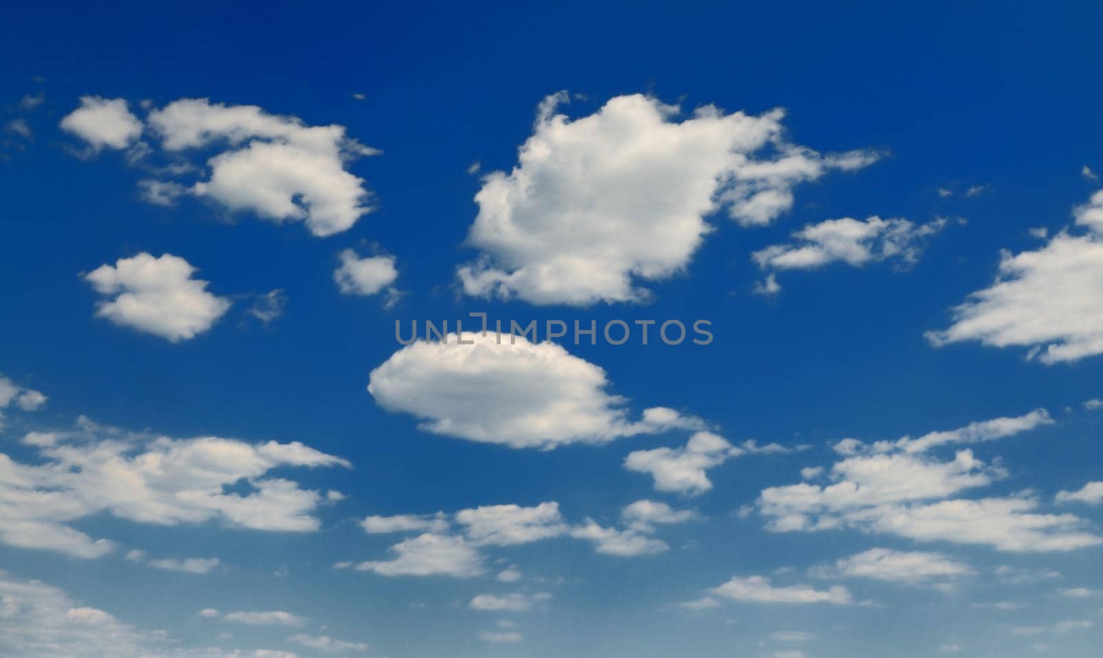 blue sky with white clouds at sunny day background