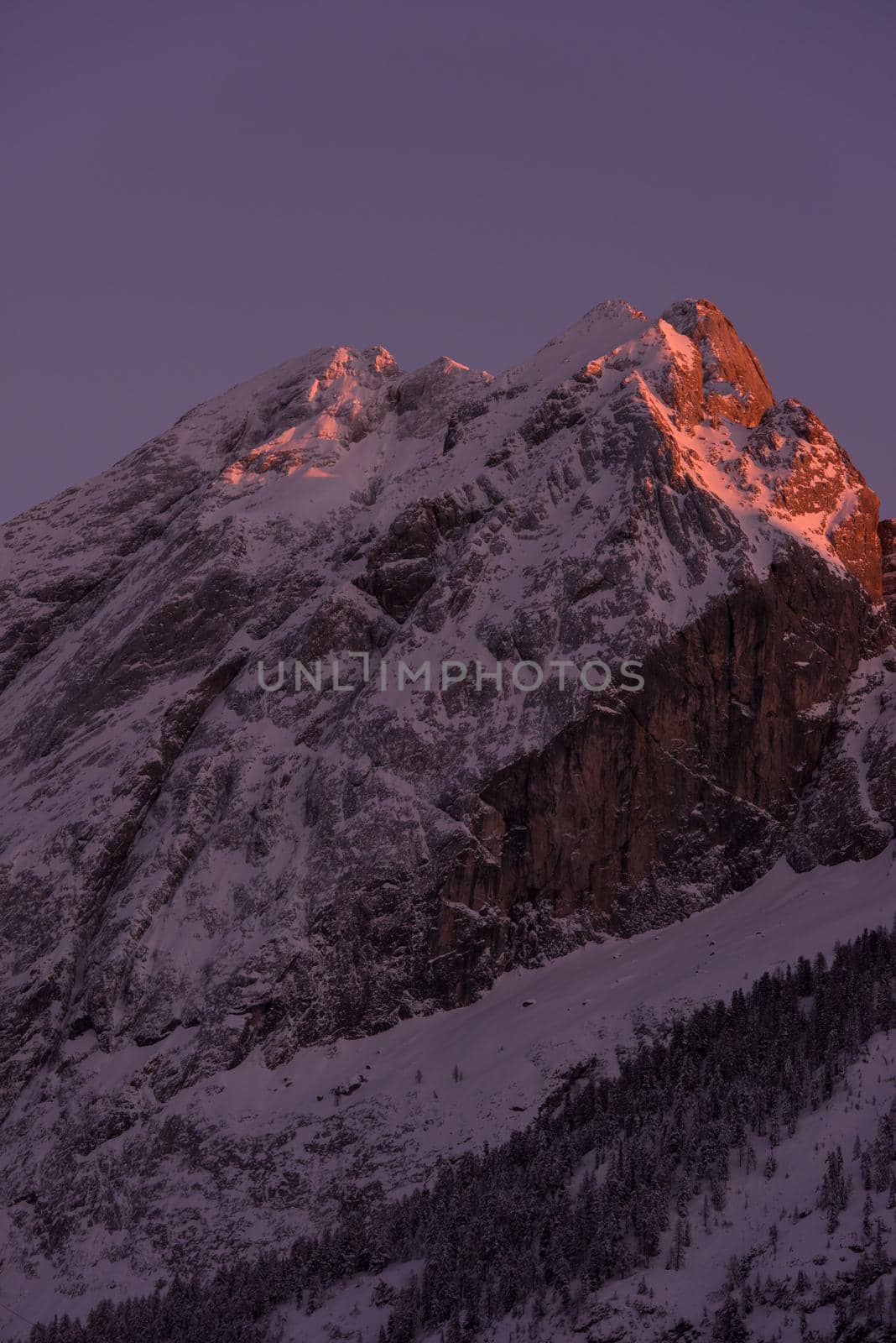 winter sunrise with fresh snow in alps mountains on fresh morning