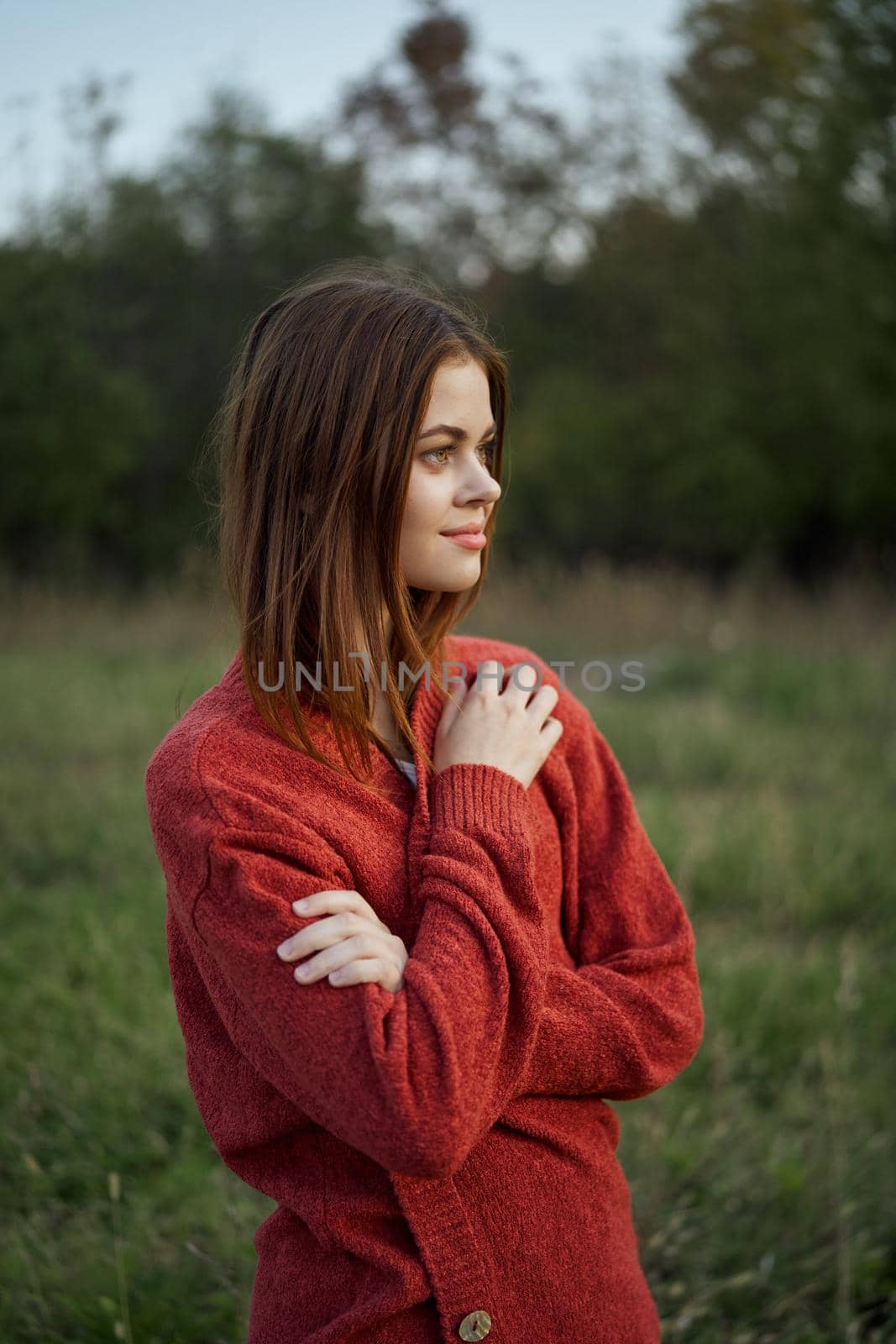 pretty woman in red sweater outdoors walk leisure by Vichizh
