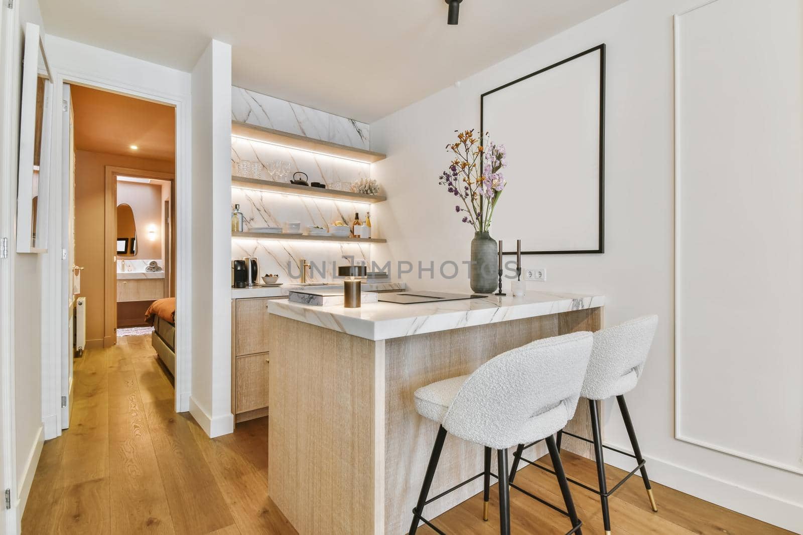 Stunning small dining area with modern plush chairs