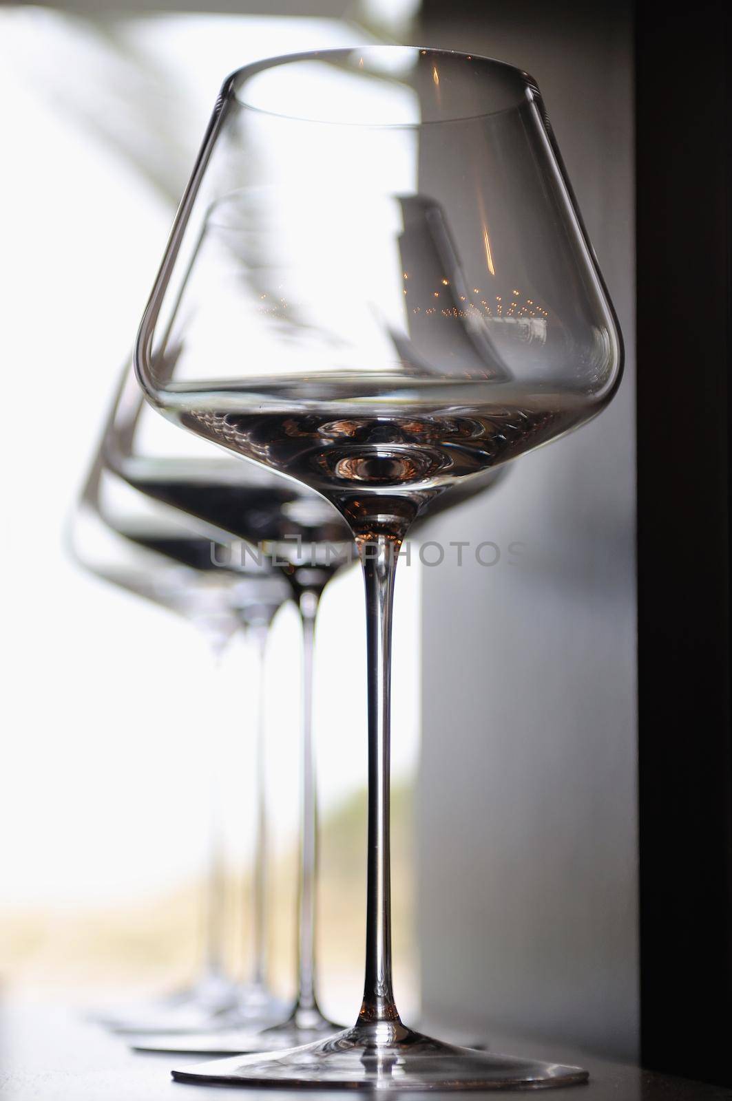 Empty very elegant wine glasses  by dotshock