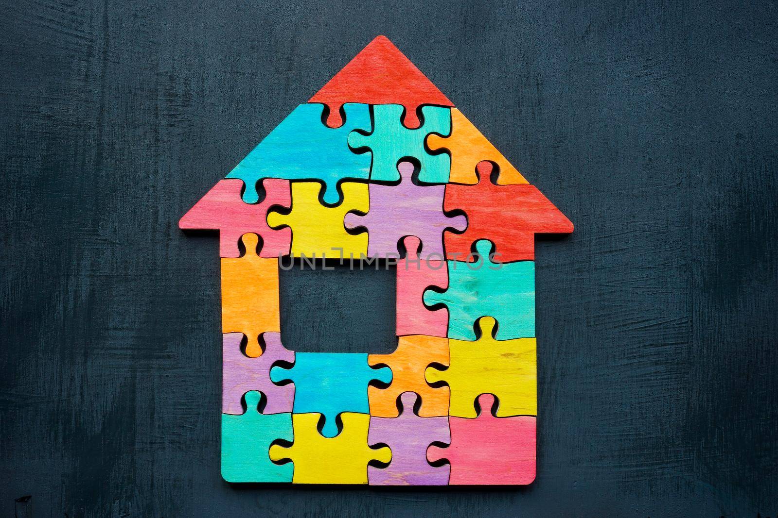 A House made of colored puzzle pieces. Diversity and Inclusion.