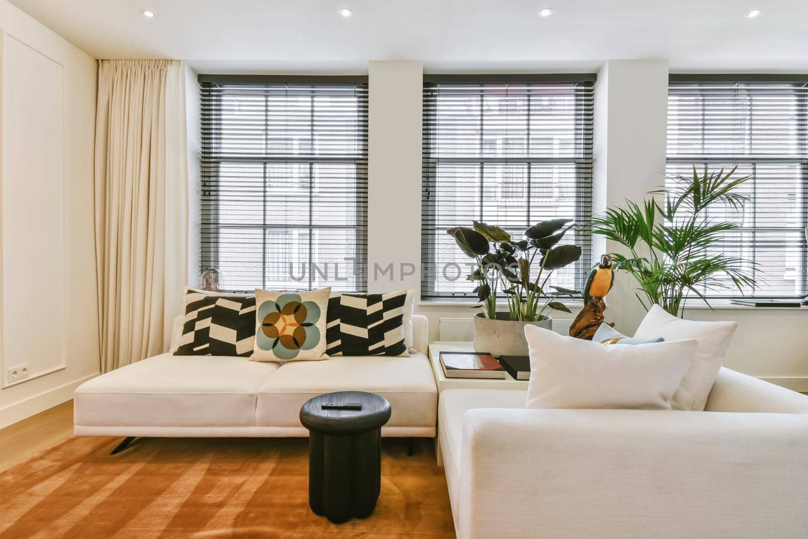 Stunning living room with white sofa and stylish throw pillows