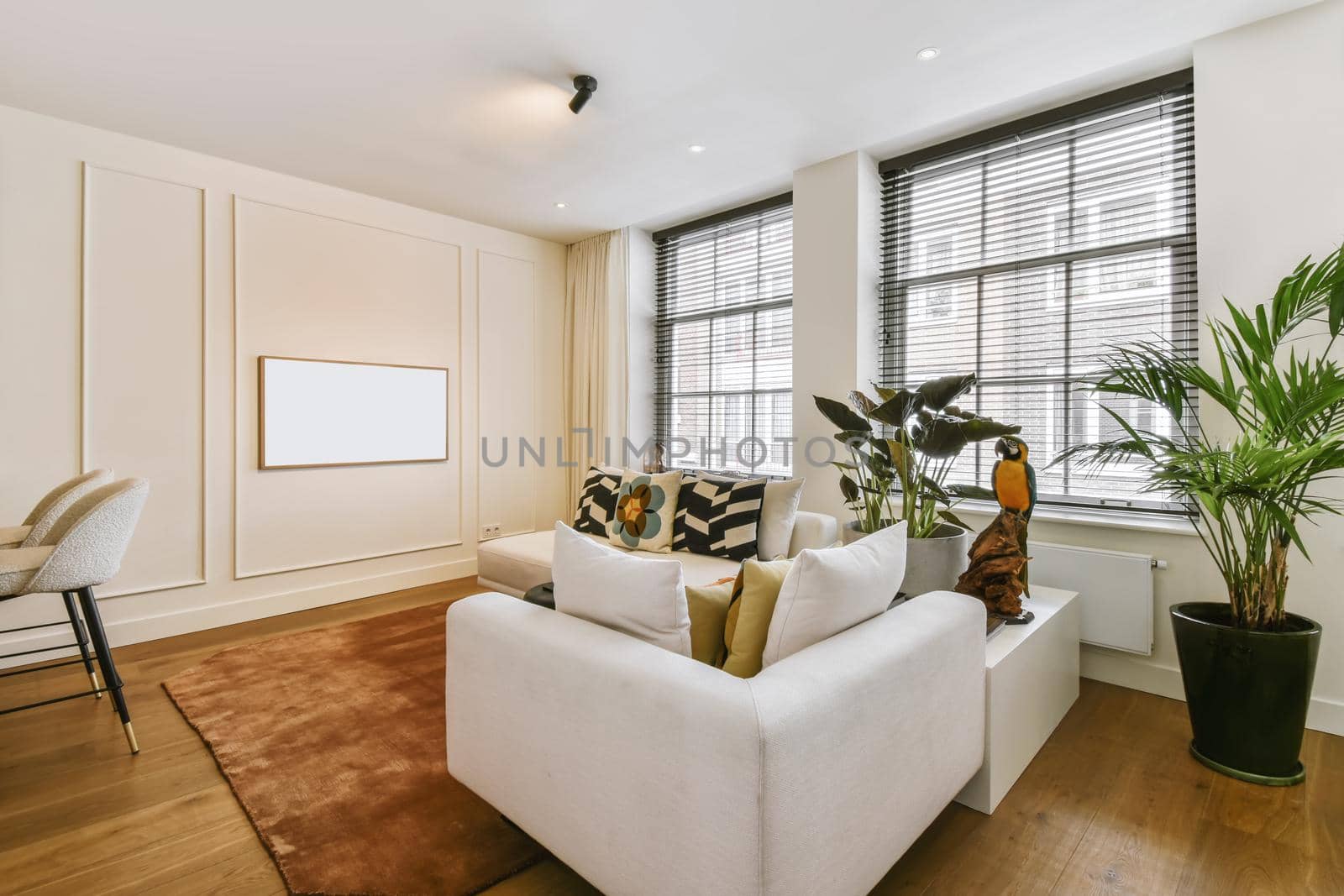 Stunning living room with white sofa and stylish throw pillows