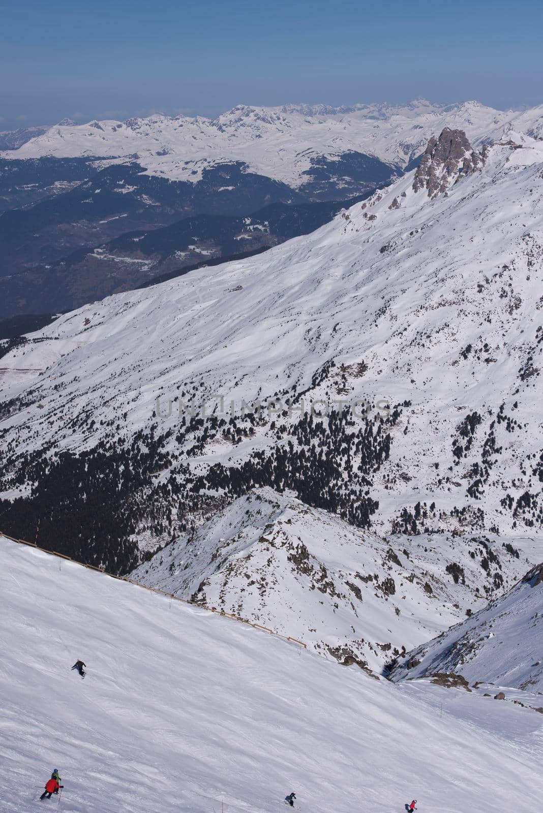 mountain landscape at winter with fresh snow on beautiful sunny day at french alps