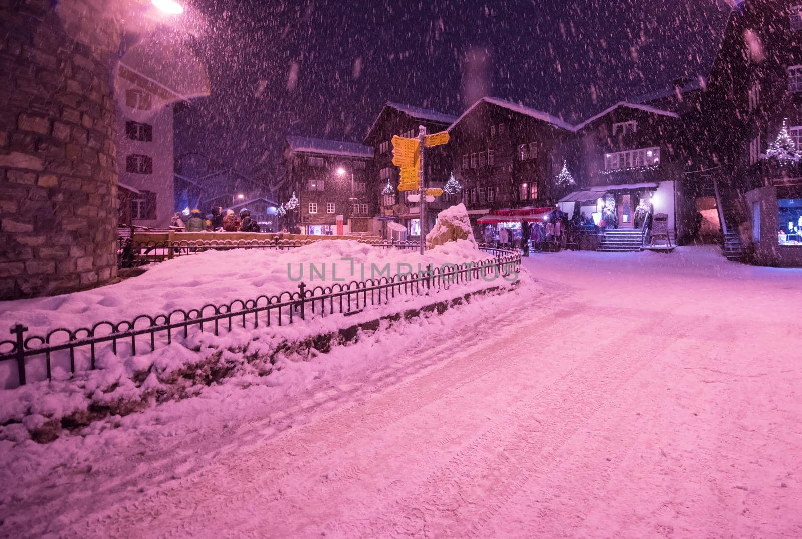 snowy streets of the Alpine mountain village by dotshock