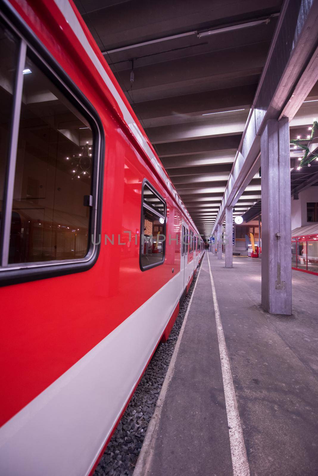 perspective view of empty subway station with modern train