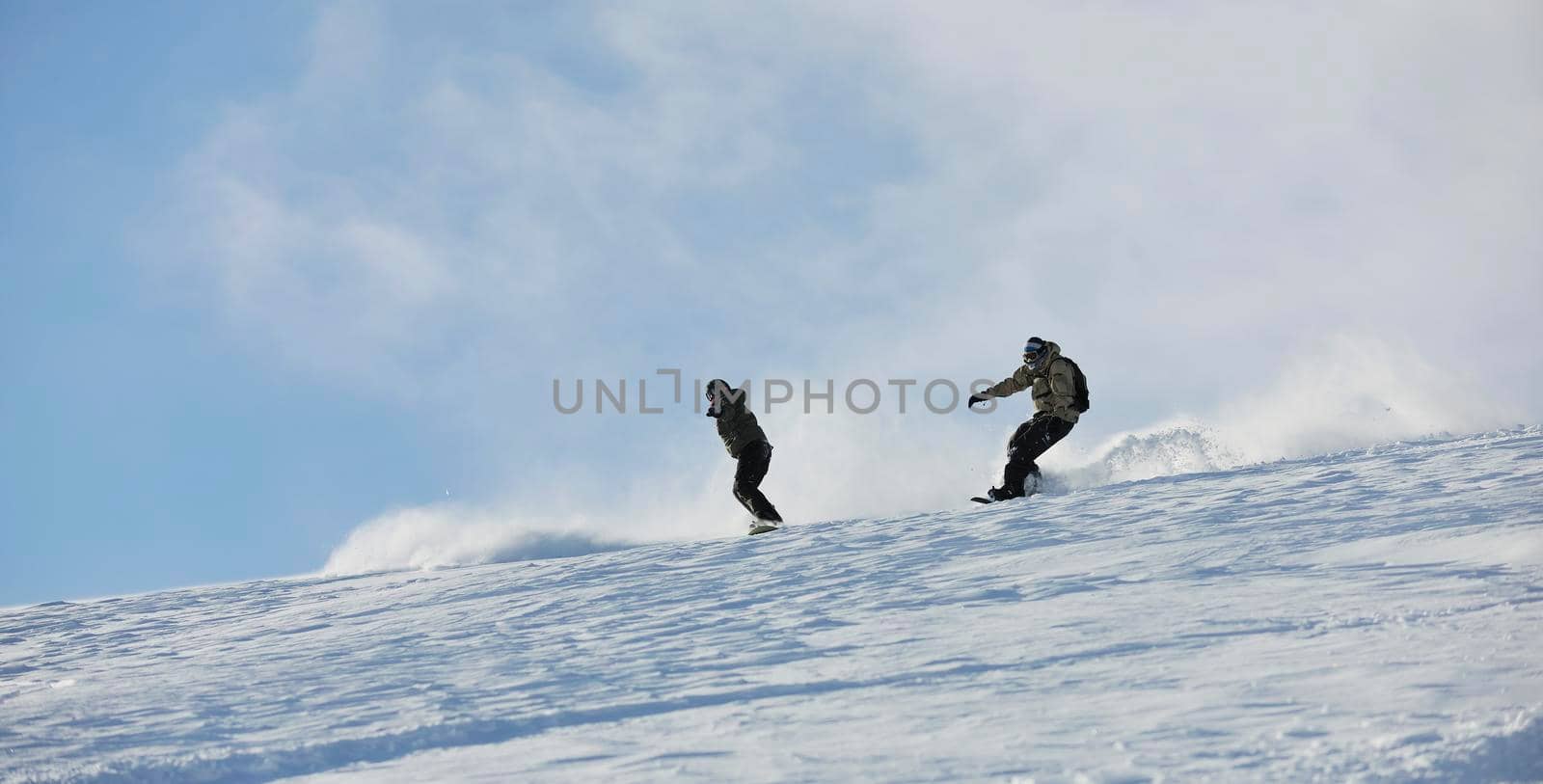 freestyle snowboarder jump and ride by dotshock