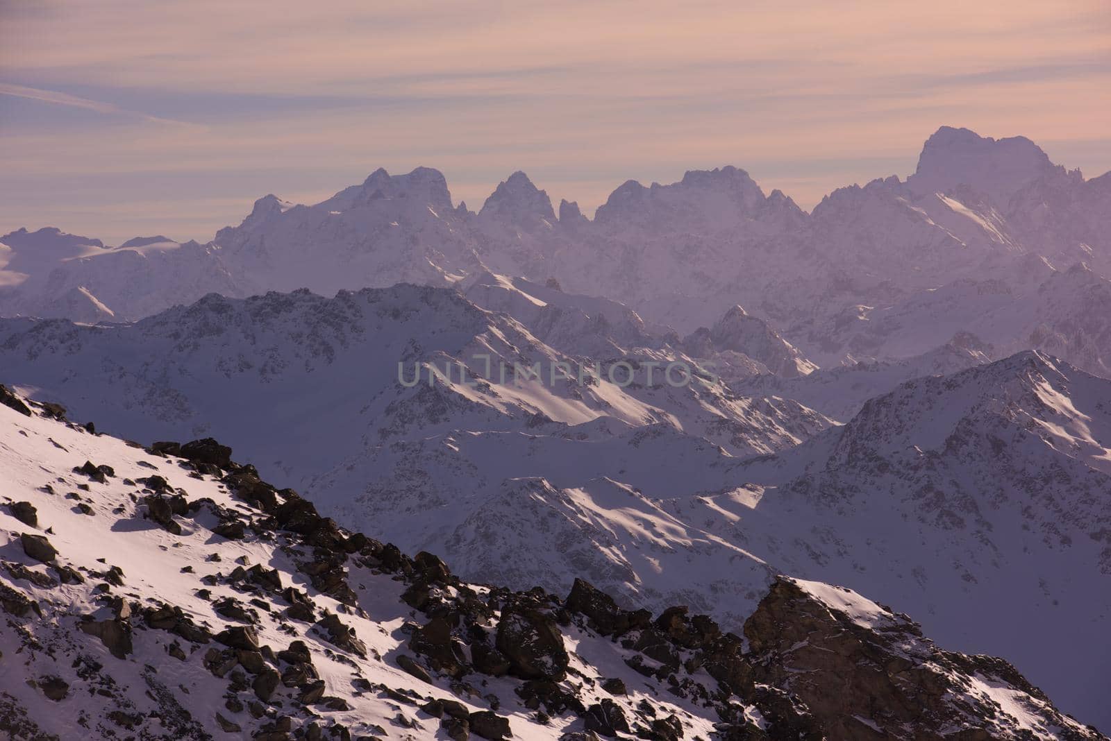 beautiful sunset on mountain at winter seasson and fresh snow