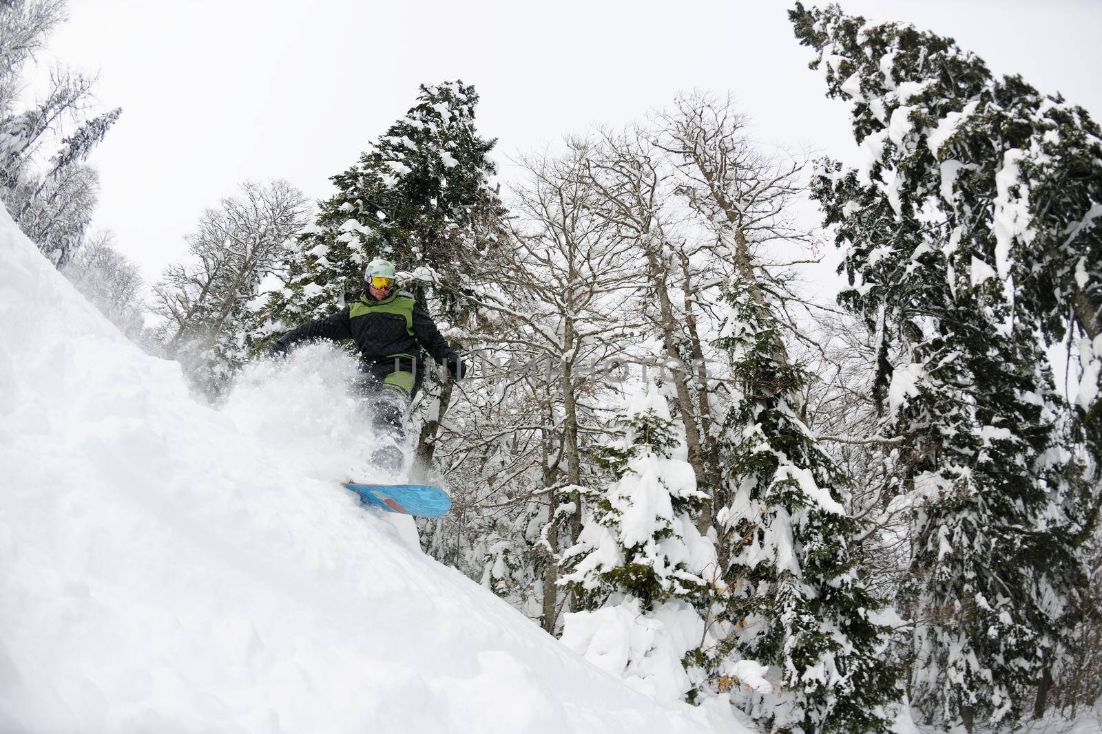 snowboarder on fresh deep snow by dotshock