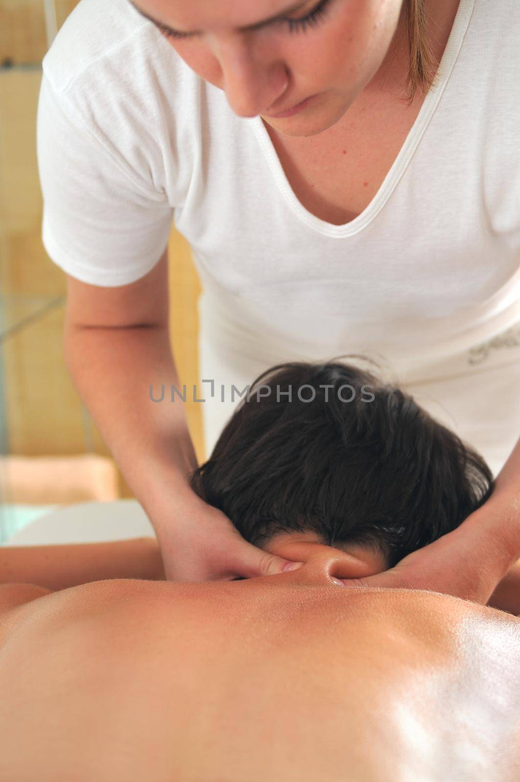 back massage at the spa and wellness center by dotshock