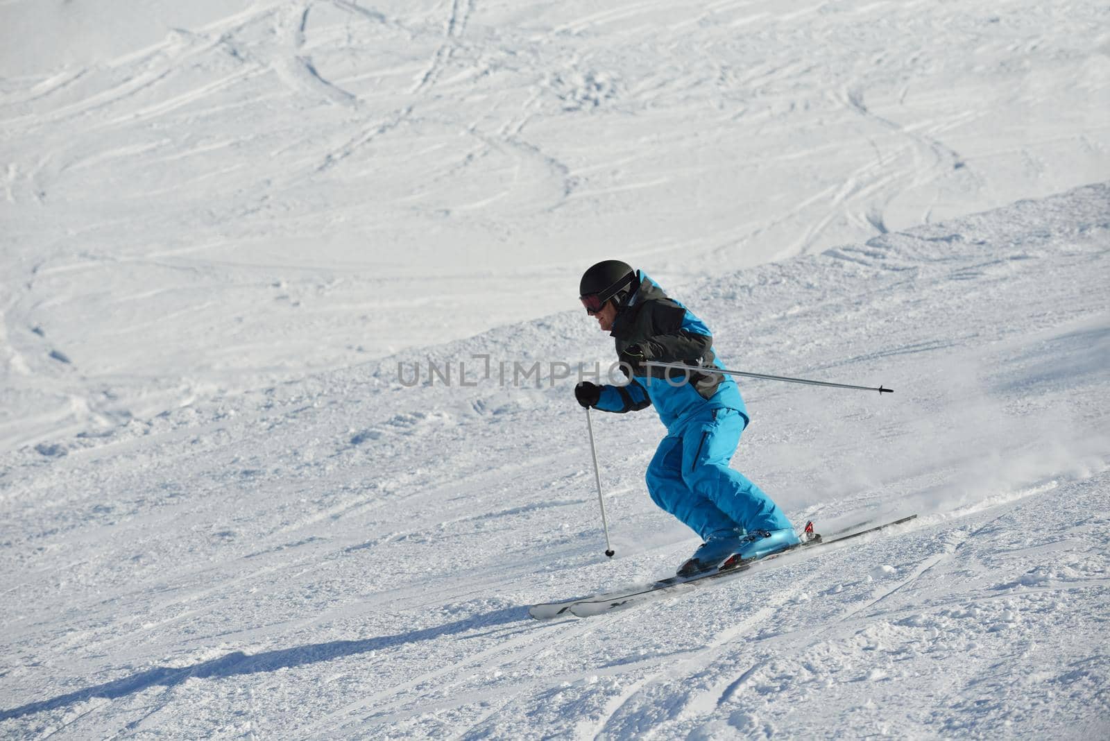 jumping skier at mountain winter snow fresh suny day