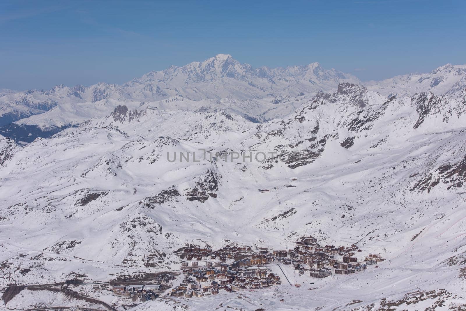 mountain landscape at winter with fresh snow on beautiful sunny day at french alps