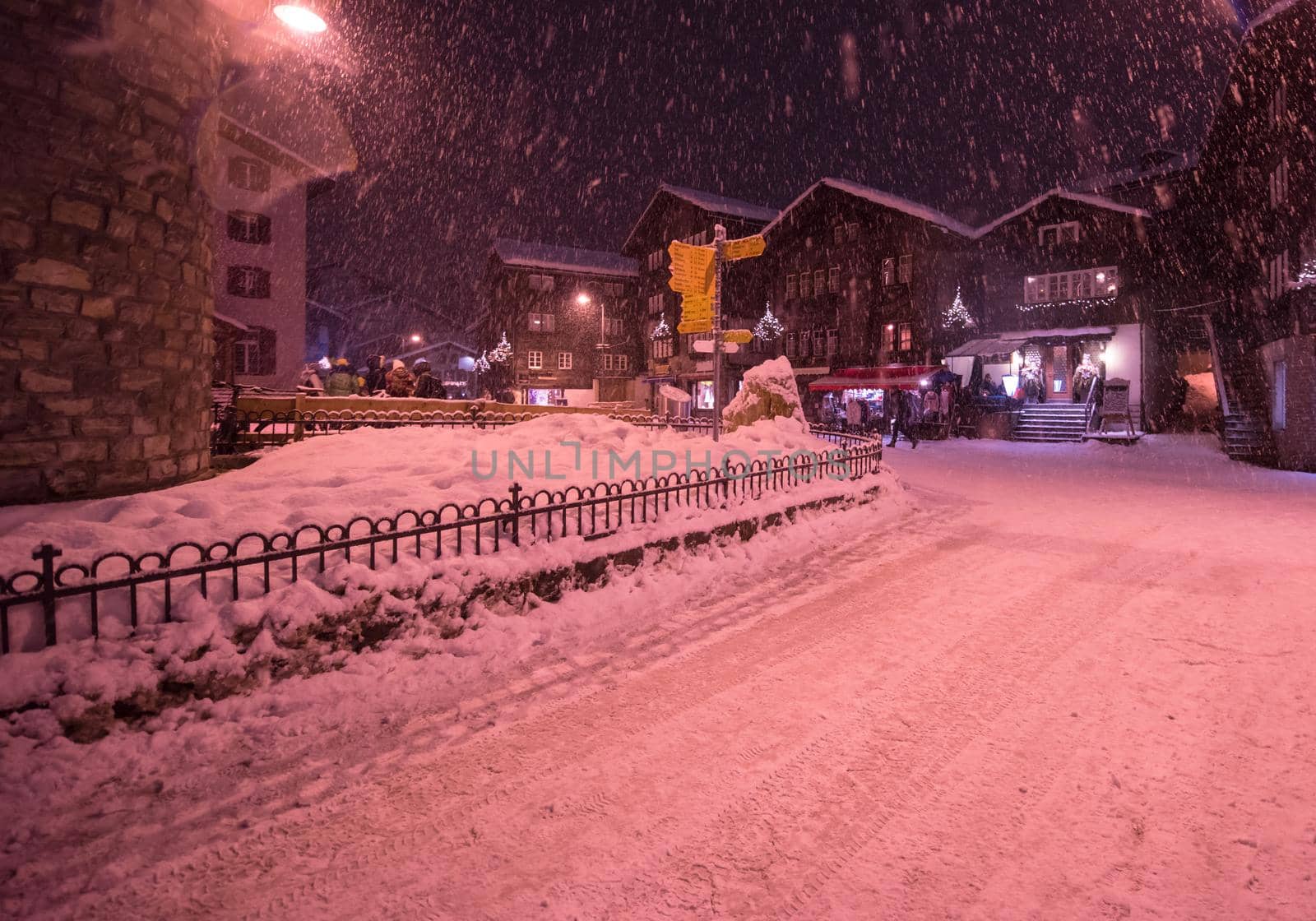 snowy streets of the Alpine mountain village by dotshock