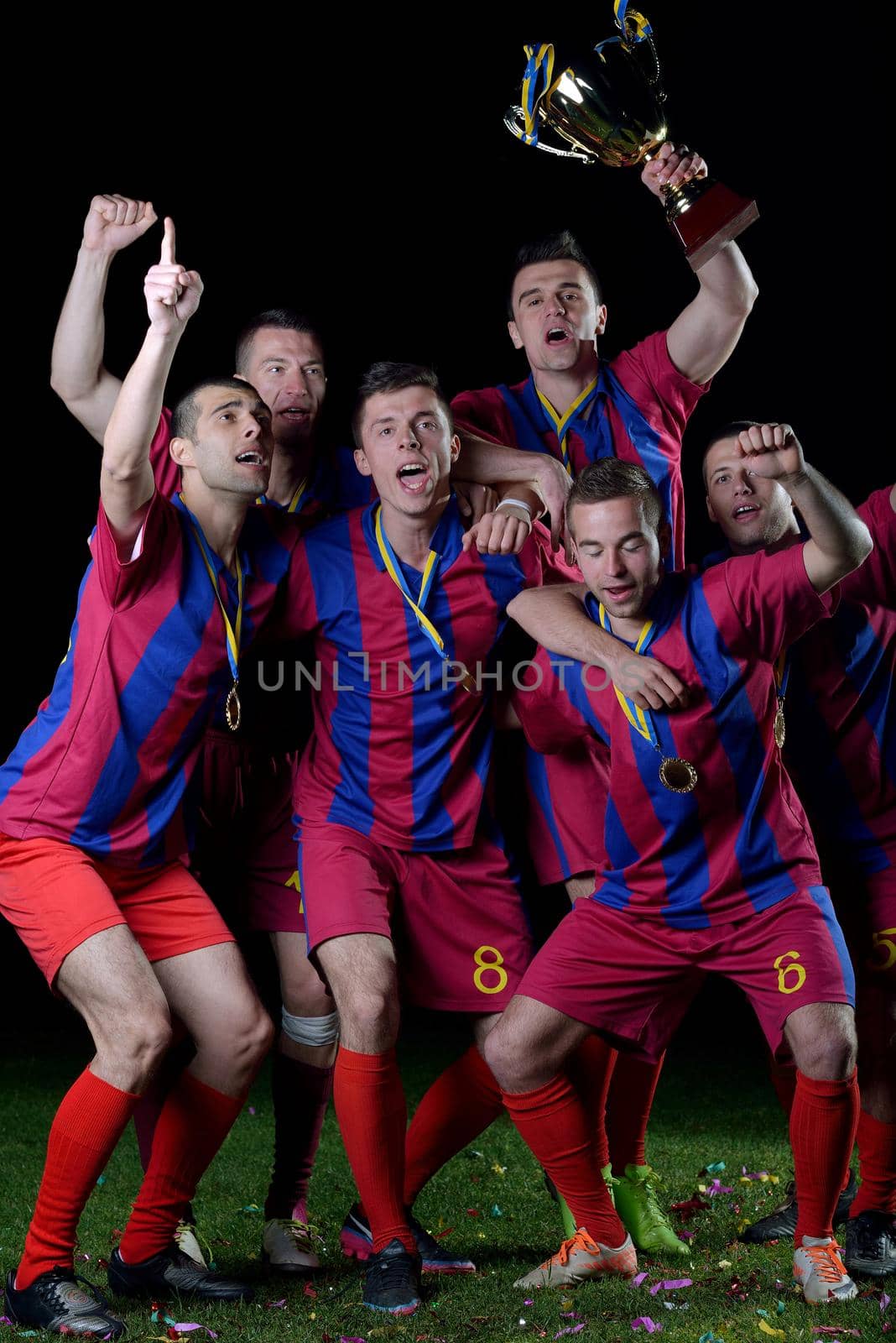 soccer players celebrating victory by dotshock