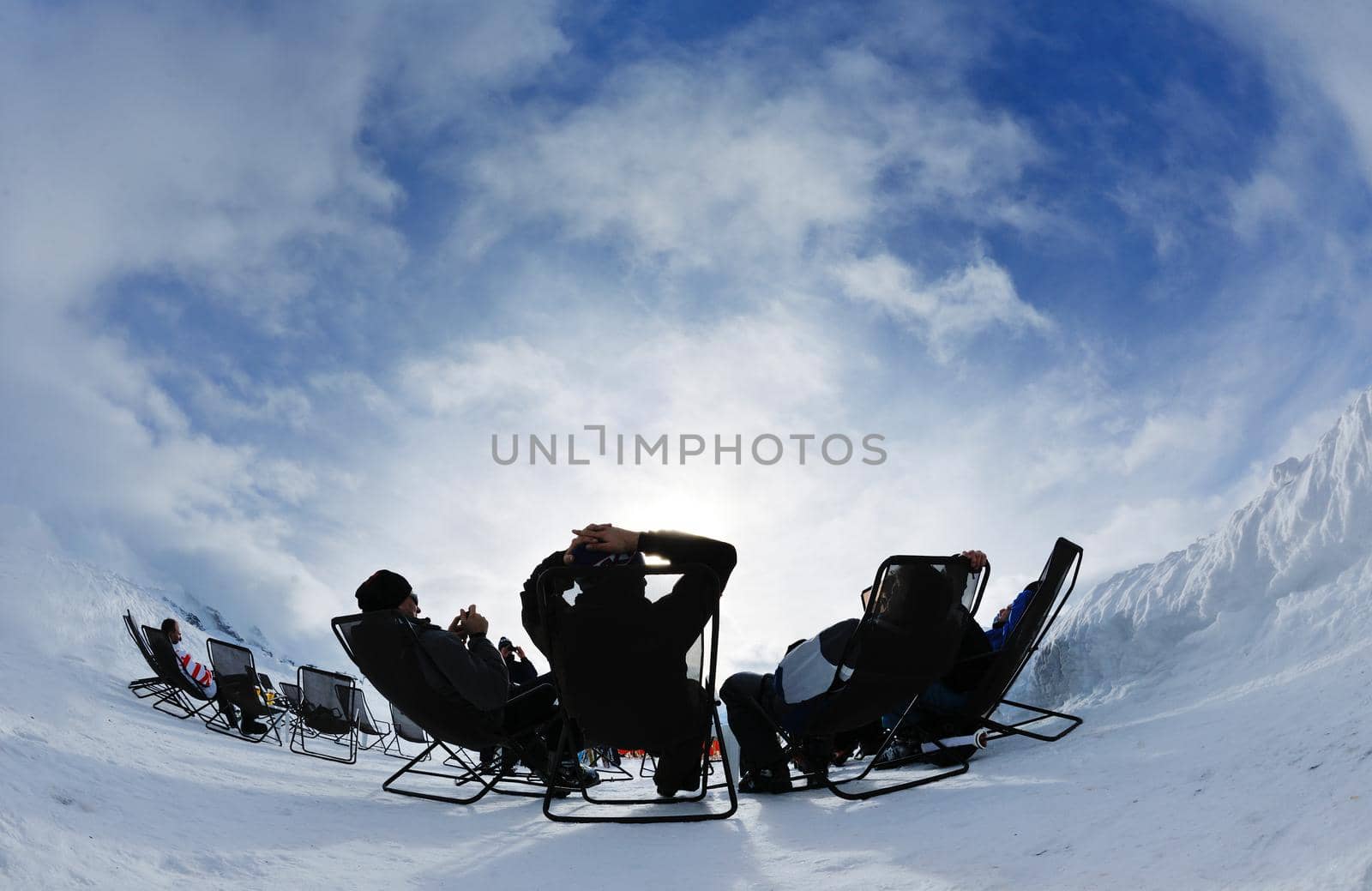 people group on snow at winter season by dotshock