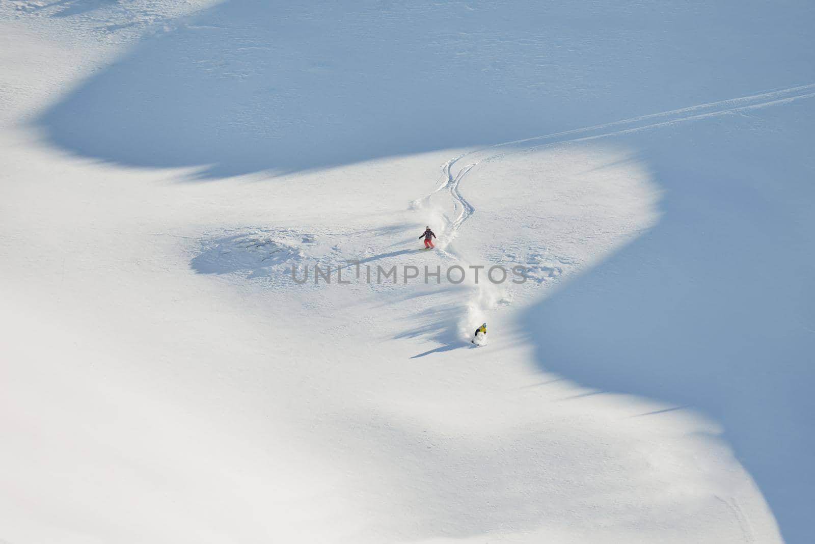 jumping skier at mountain winter snow fresh suny day