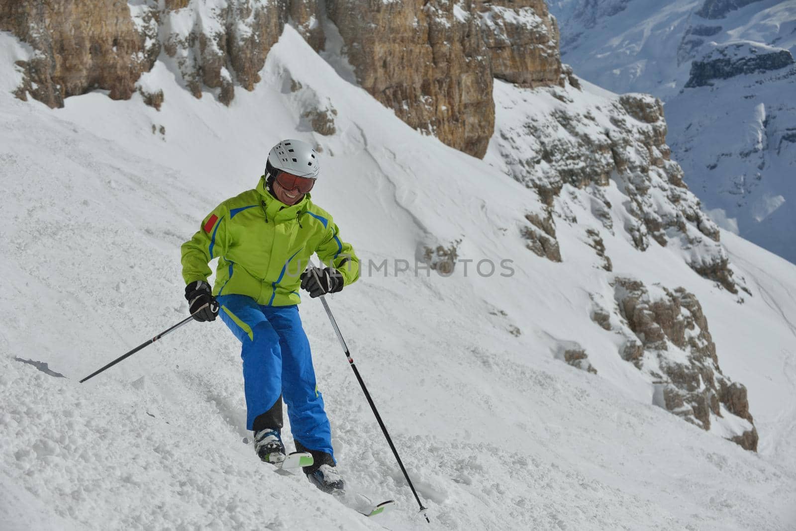 jumping skier at mountain winter snow fresh suny day