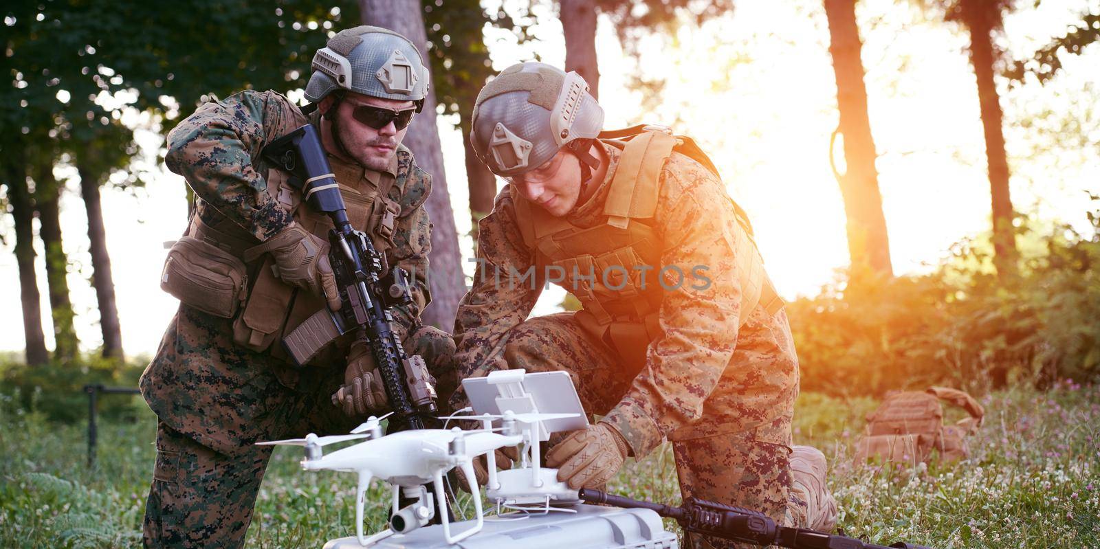 Modern Warfare Soldiers Squad are Using Drone for Scouting and Surveillance During Military Operation in the Forest.