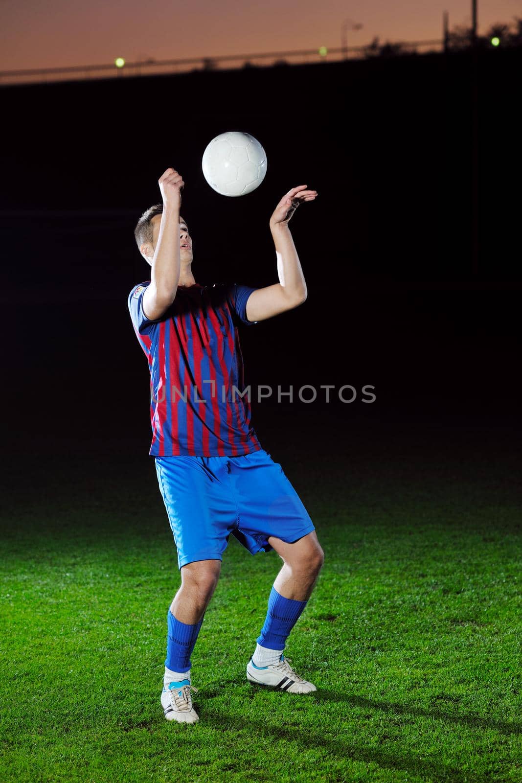 football player in action by dotshock