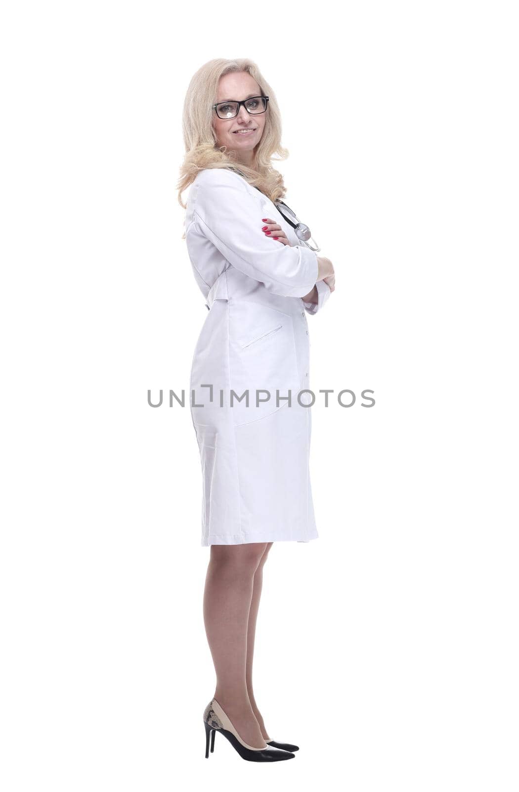 in full growth. attractive woman doctor looking at you . isolated on a white background.