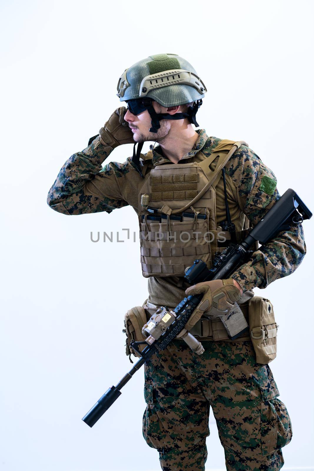 american  marine corps special operations modern warfare soldier with fire arm weapon and protective army tactical gear ready for battle