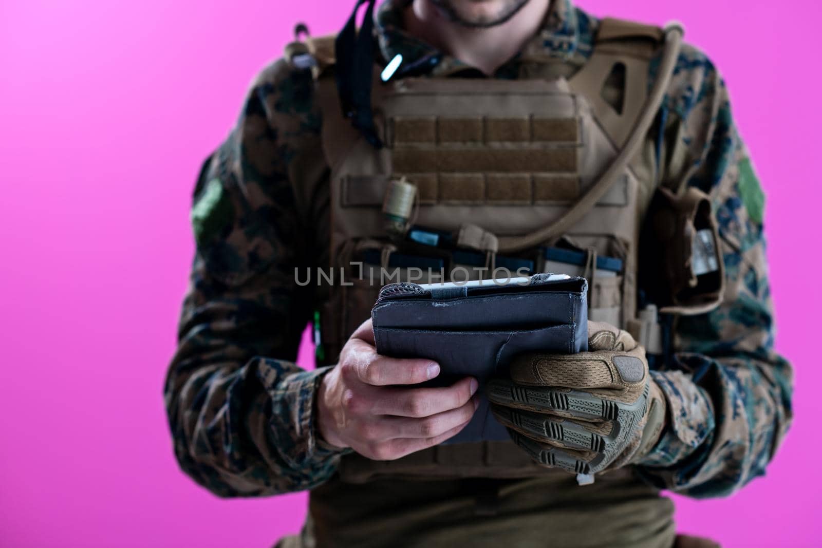 soldier using tablet computer closeup by dotshock