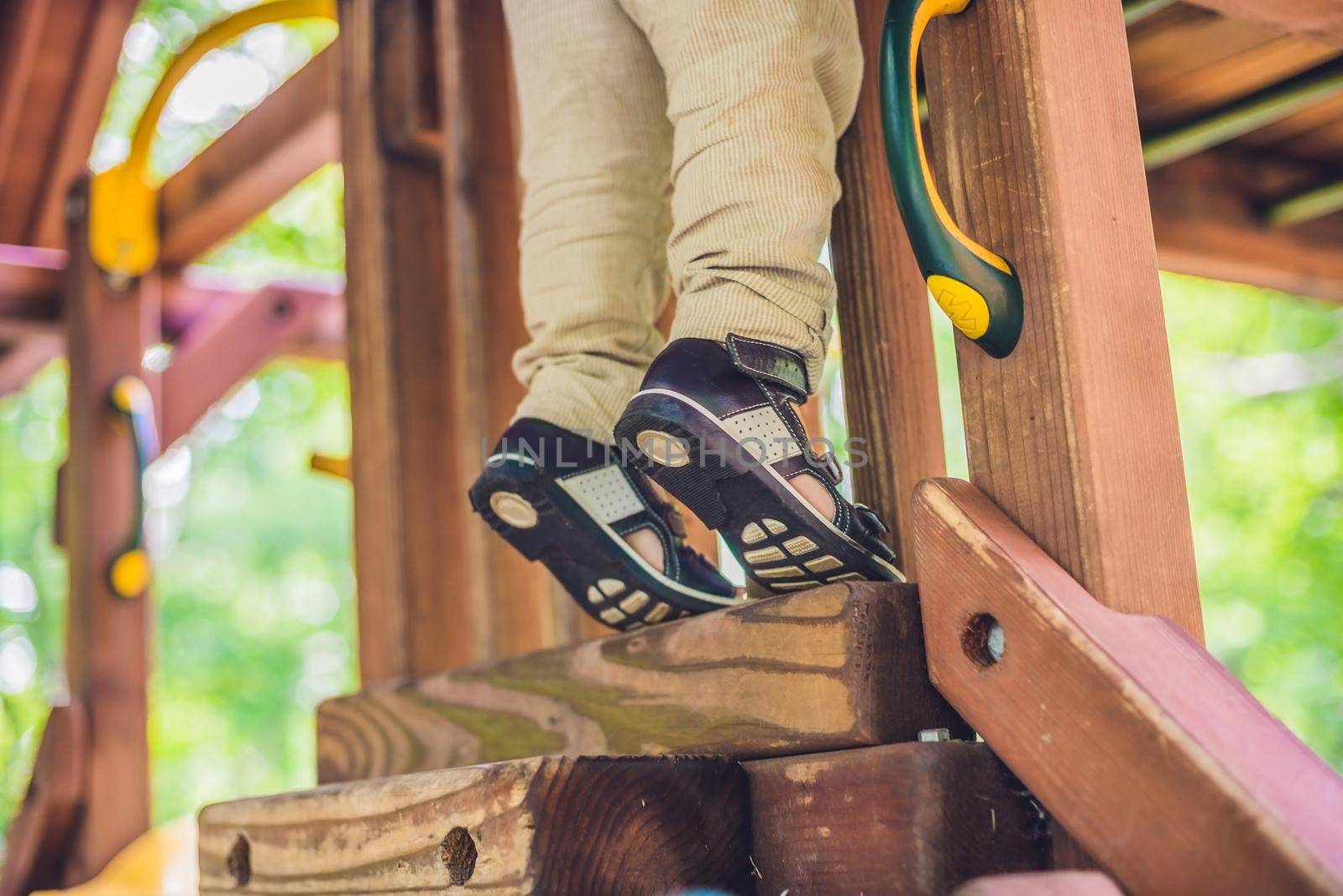 children's orthopedic shoes on the boy's feet. Thomas Heel