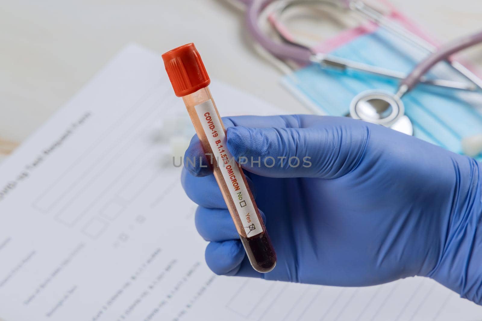 Diagnostic testing for COVID-19 new version Omicron blood laboratory test in hospital lab medical science professional taking sample test tube