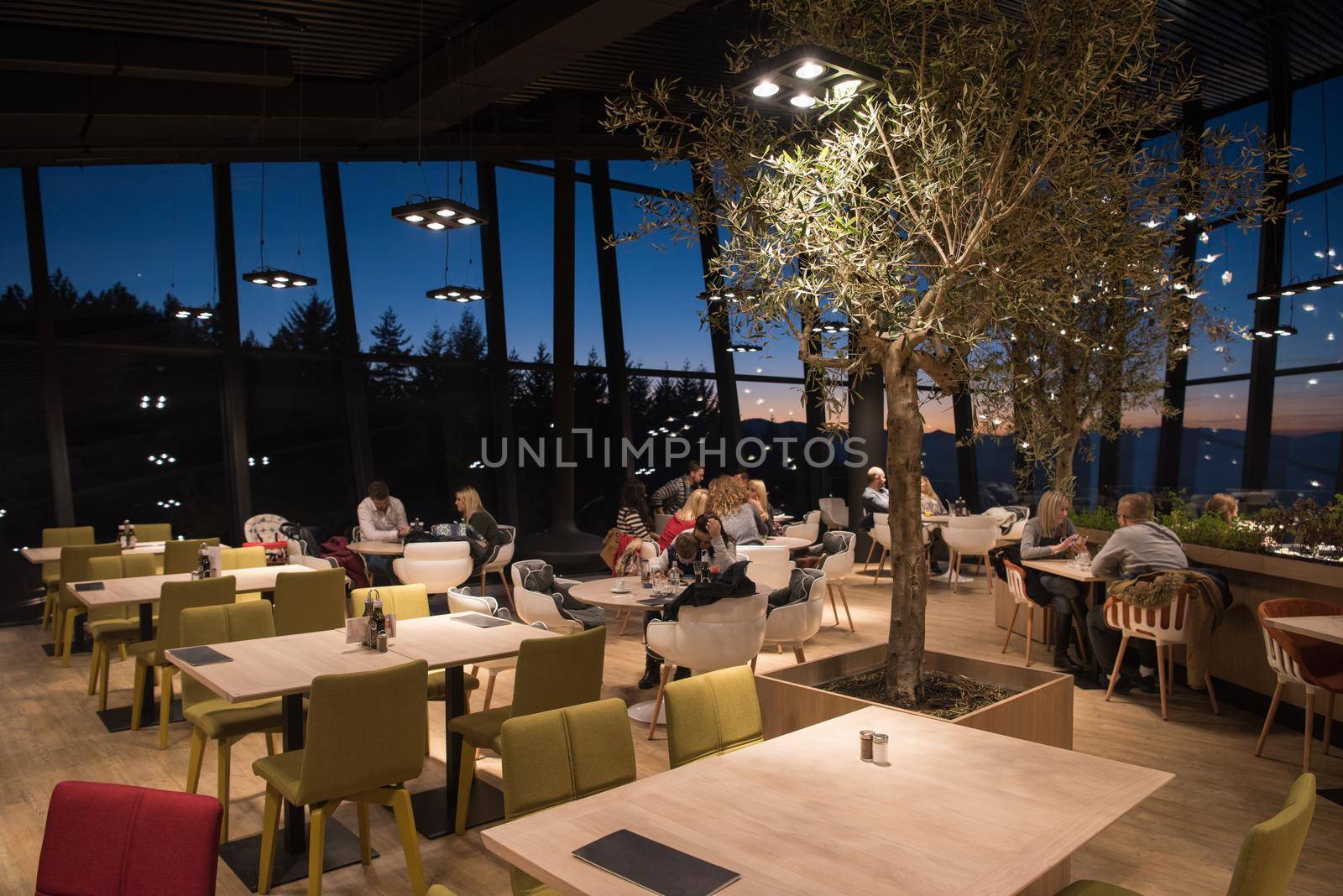 People enjoy in the lovely evening at a luxury restaurant