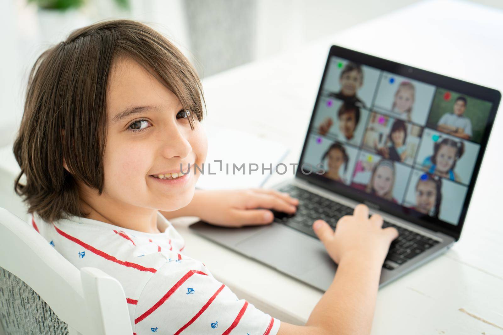 Little boy having online school distance learning class