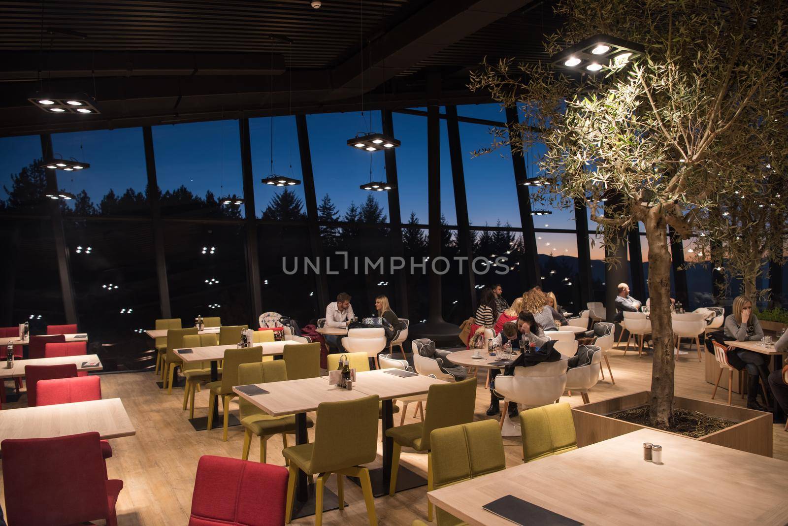 People enjoy in the lovely evening at a luxury restaurant