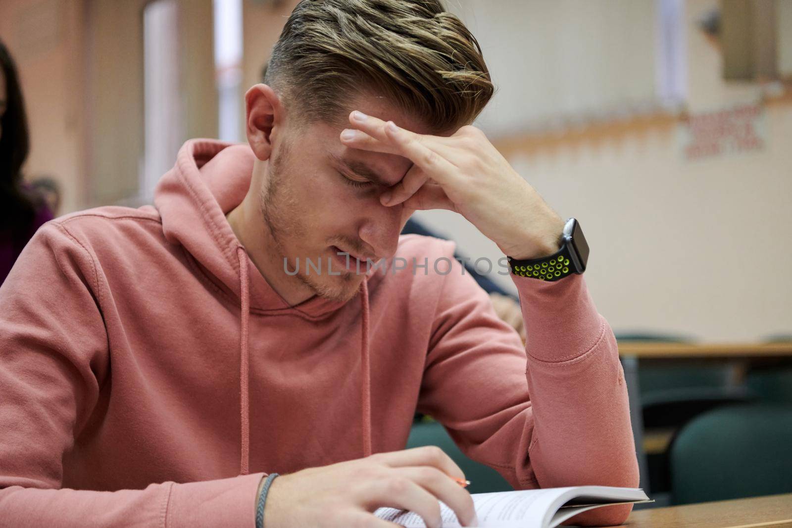 the student has headaches while listening to a math class in college