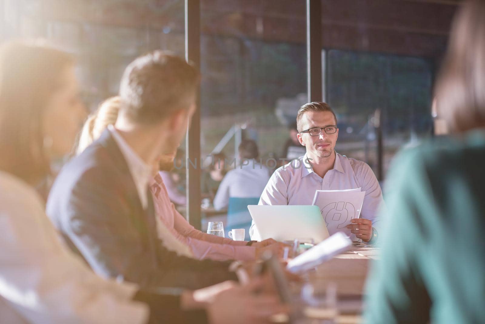 young business team on meeting at office by dotshock