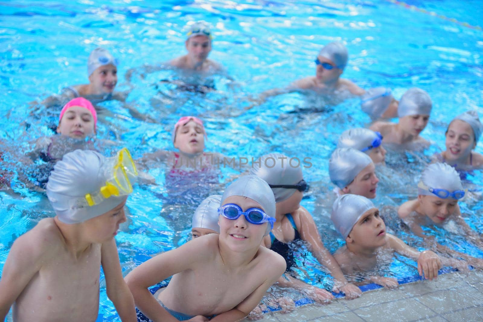 children group  at swimming pool by dotshock