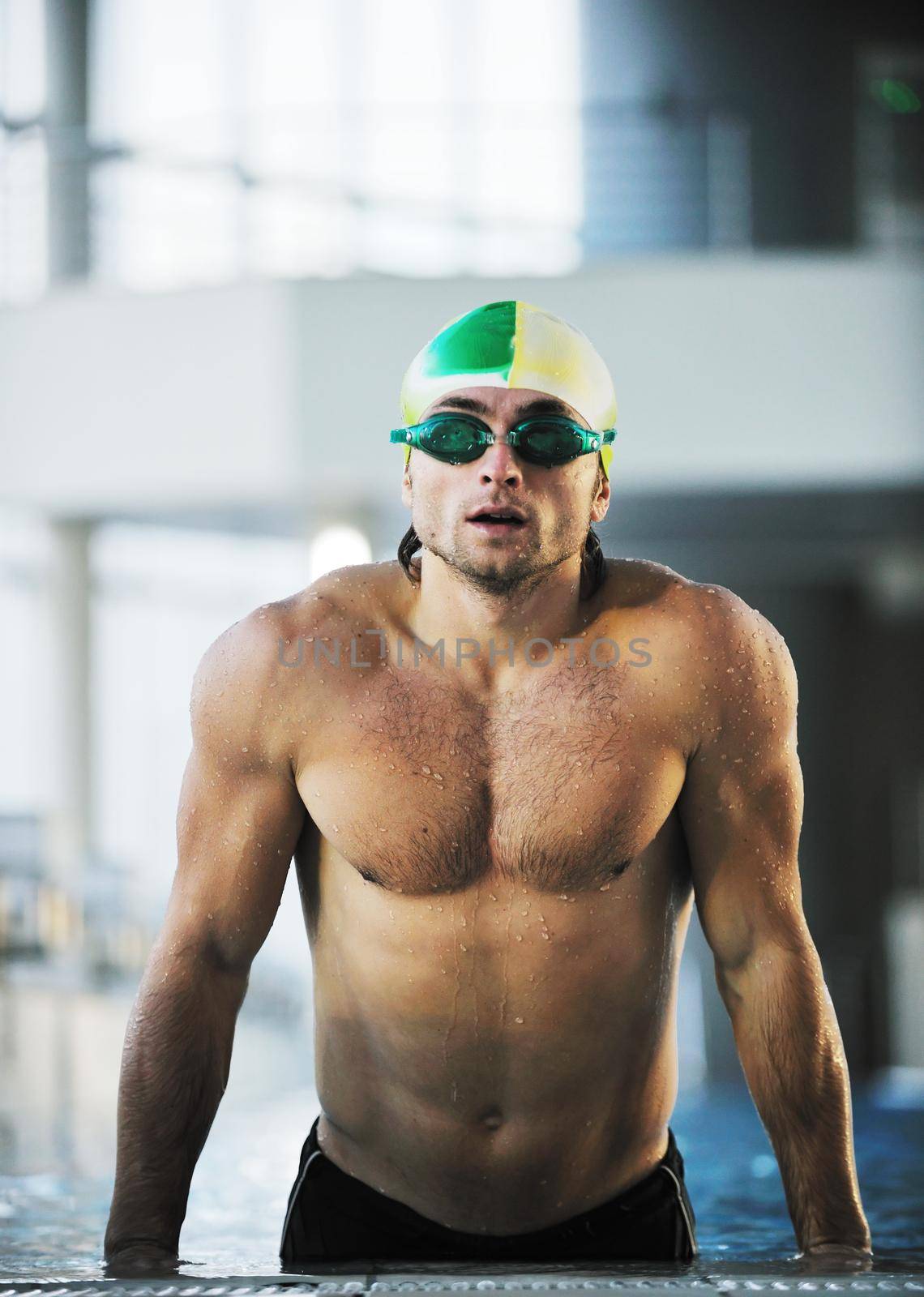 health and fitness lifestyle concept with young athlete swimmer recreating  on olimpic pool