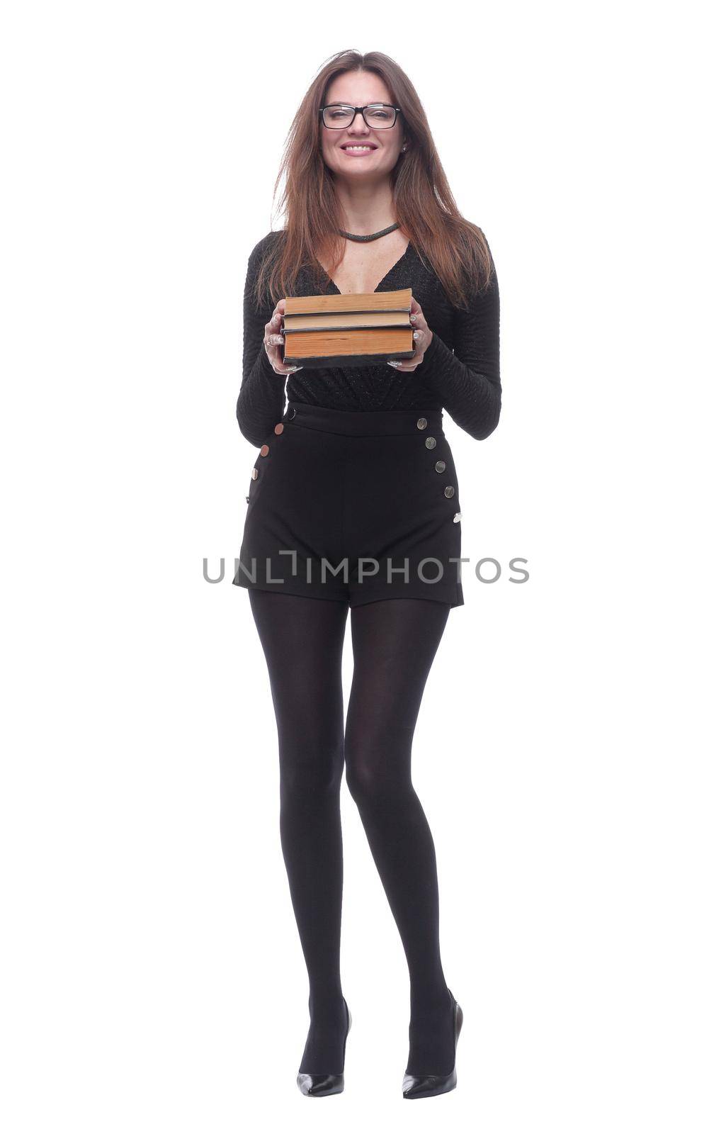 in full growth. elegant young woman with a stack of books . isolated on a white background.