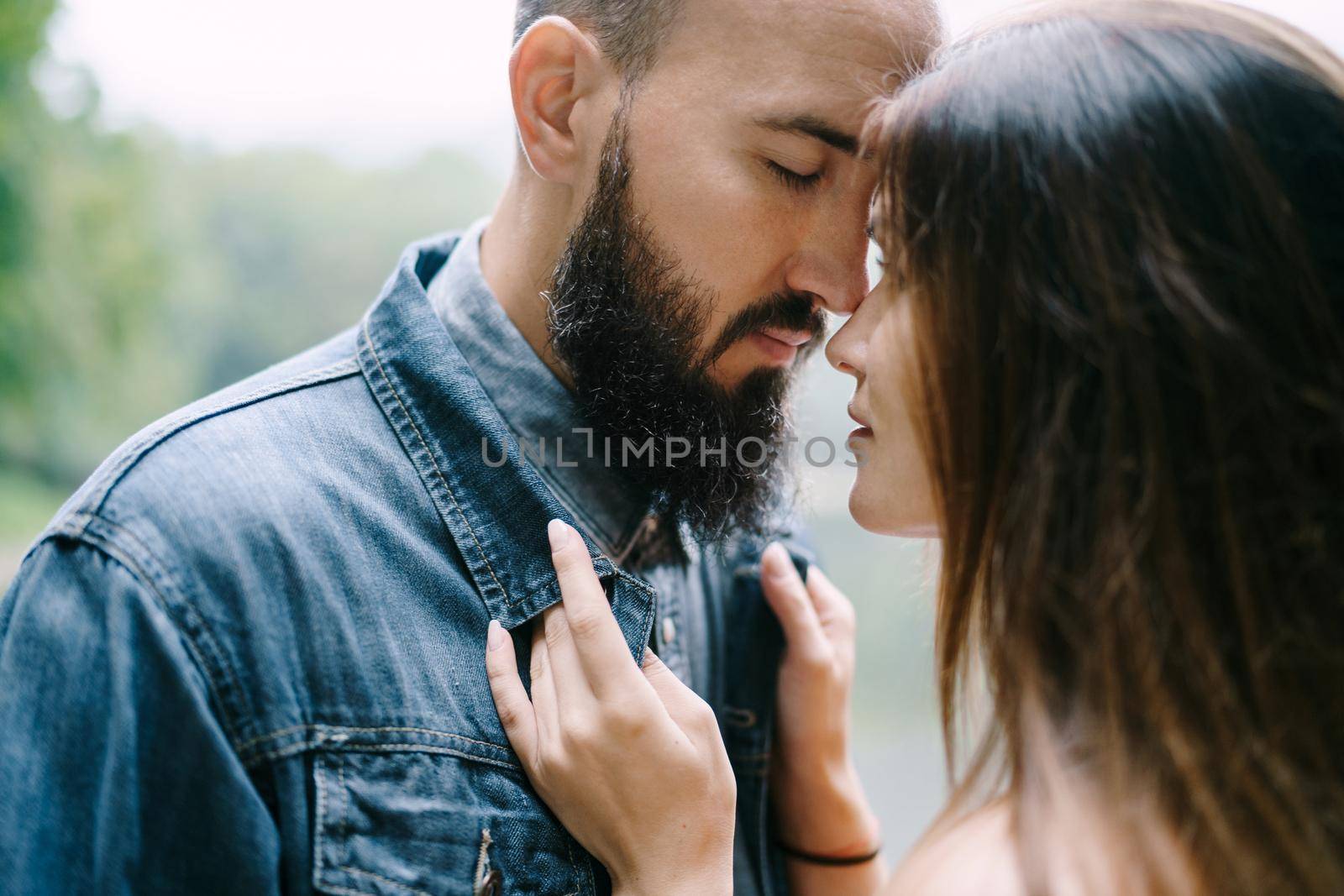 Man leaned his forehead against the woman. Close-up. High quality photo