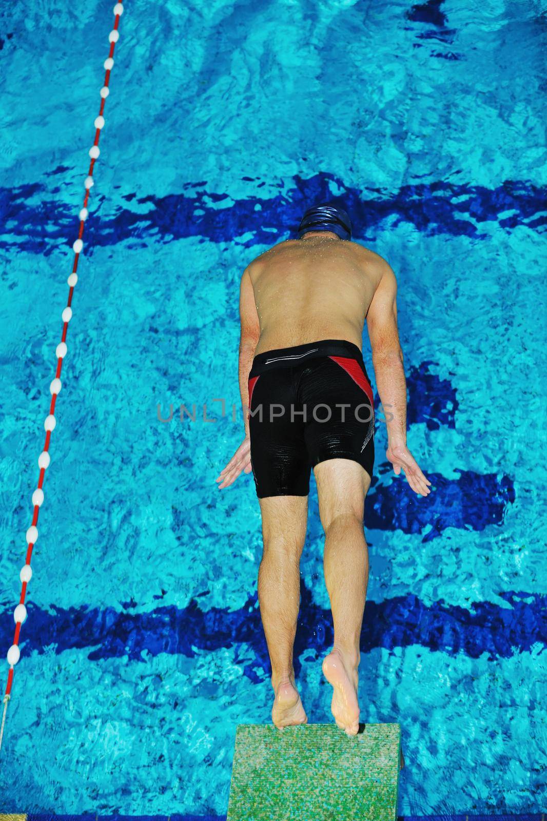 health and fitness lifestyle concept with young athlete swimmer recreating  on olimpic pool