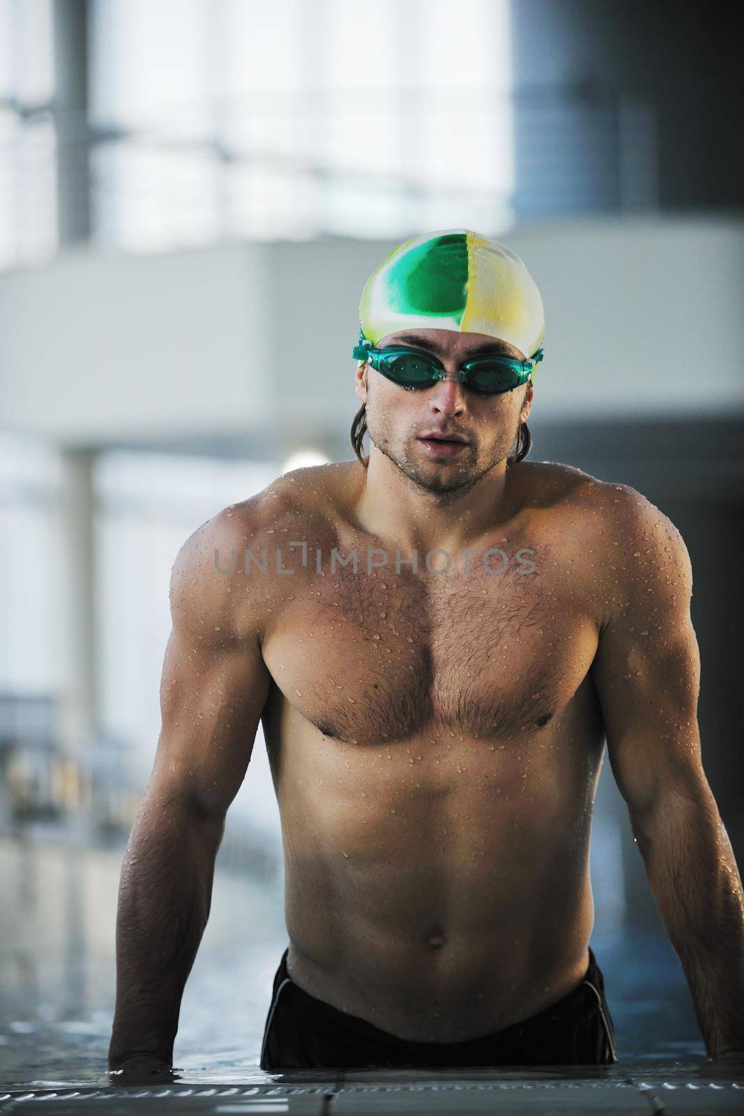 health and fitness lifestyle concept with young athlete swimmer recreating  on olimpic pool