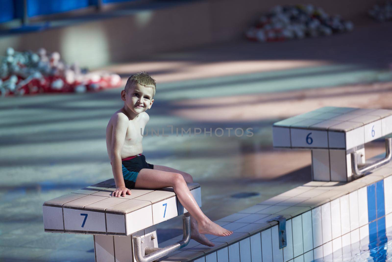 child portrait on swimming pool by dotshock