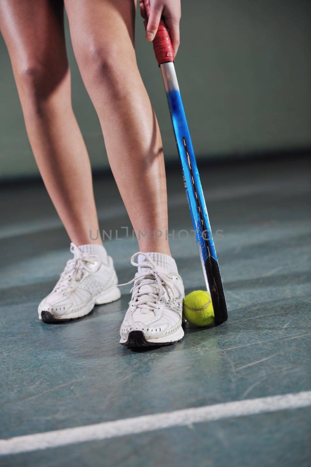 one woman playing tennis sport indoor