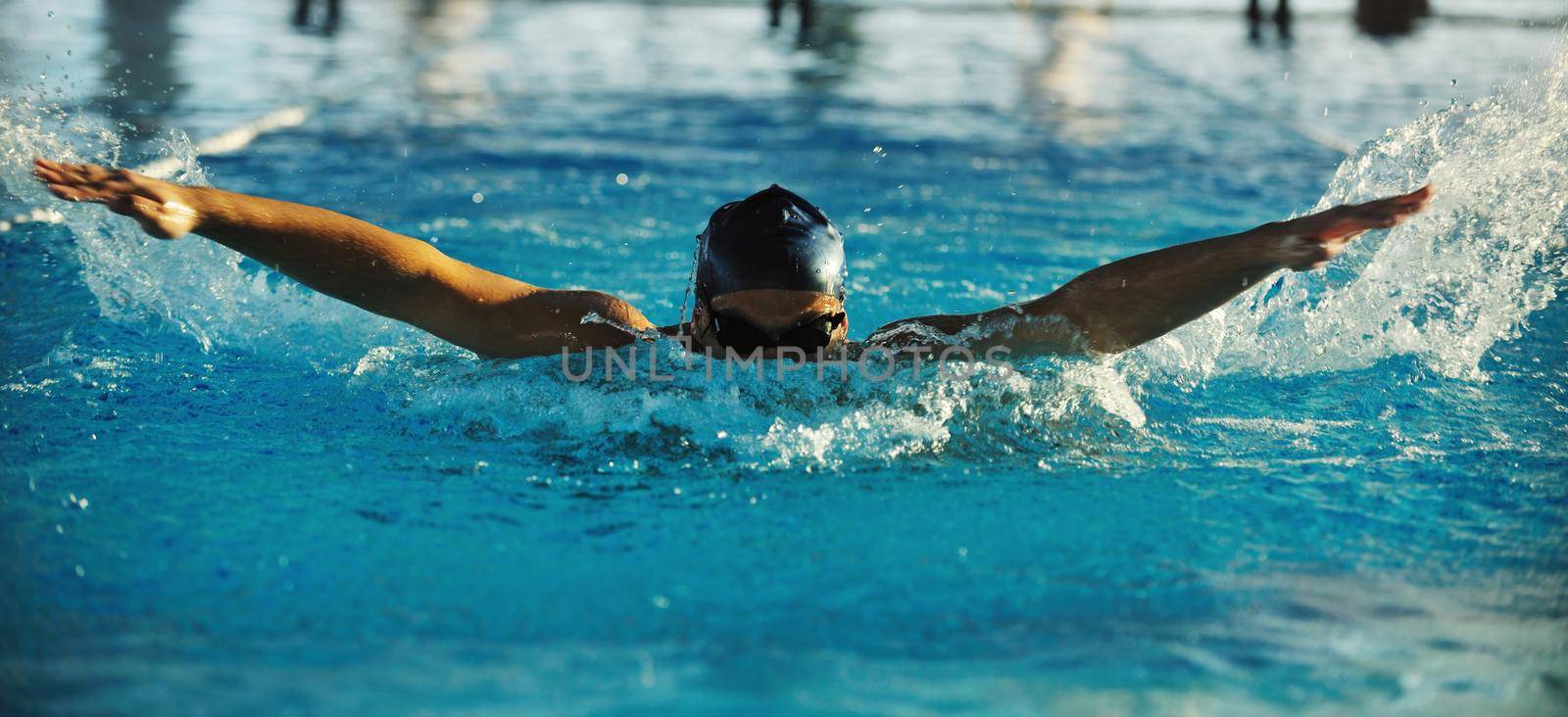 health and fitness lifestyle concept with young athlete swimmer recreating  on olimpic pool